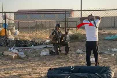 ABD askerinin itibarı yerlerde! Elinde sopayla karşılayıp diz çöktürdü