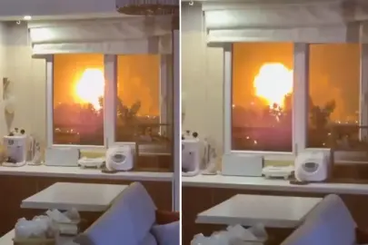 Evinin penceresinden savaşı kaydetti